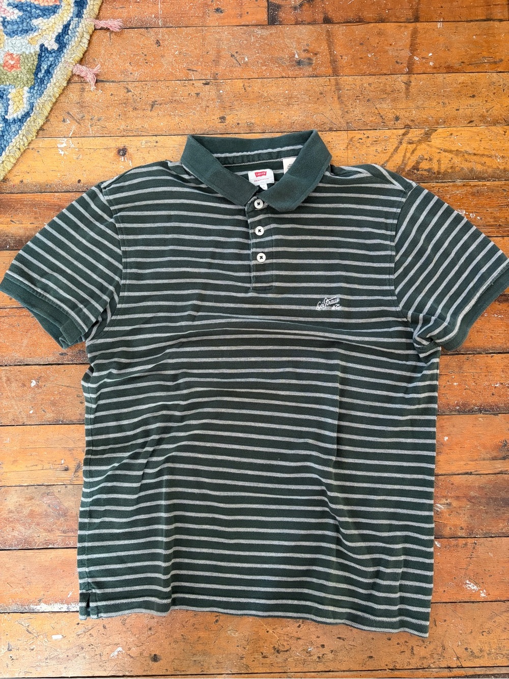 Levi’s green stripped retro style cotton polo shirt size L